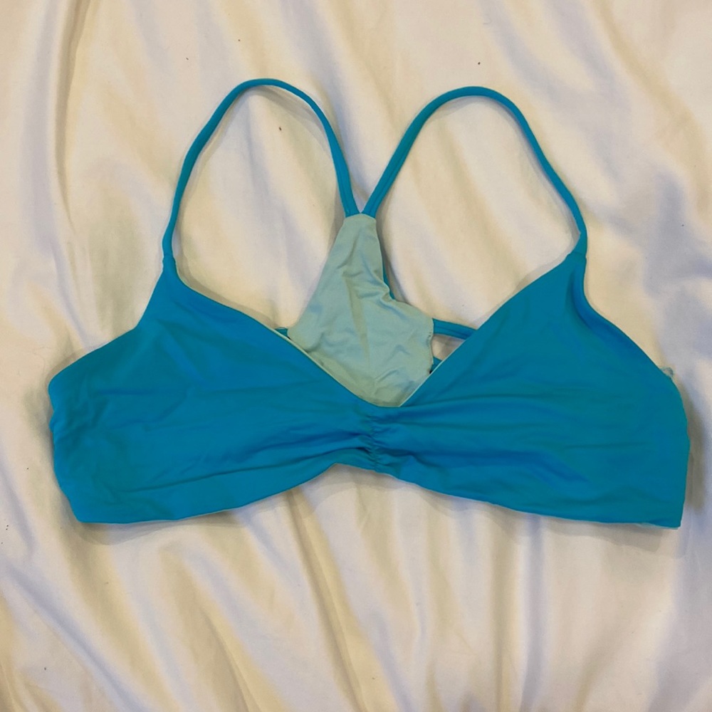 L*space medium bikini top. Reversible. Light and Robin egg blue